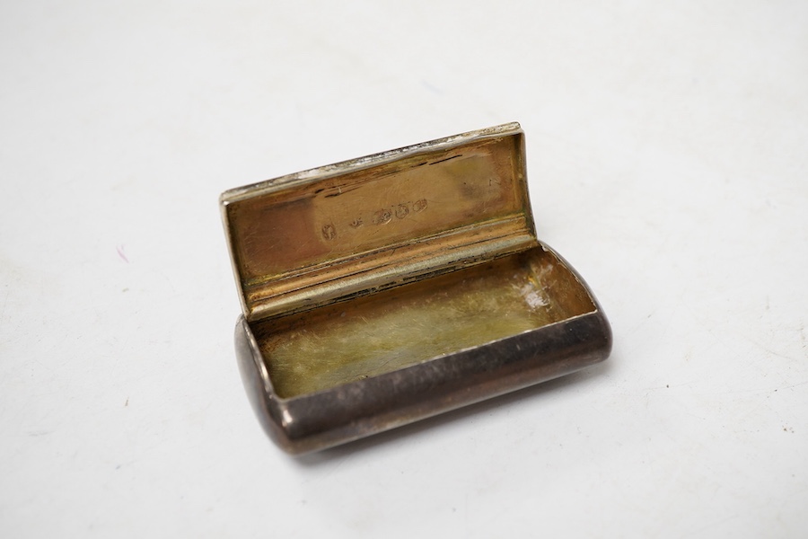 A George III silver ovoid snuff box, with engraved monogram, Samuel Pemberton, Birmingham, 1804, 59mm.